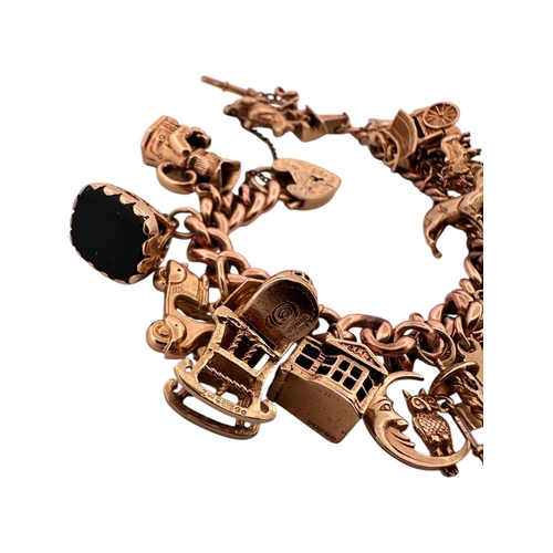 50 - Nine Carat Gold Charm Bracelet with 25 Charms. 78.2g