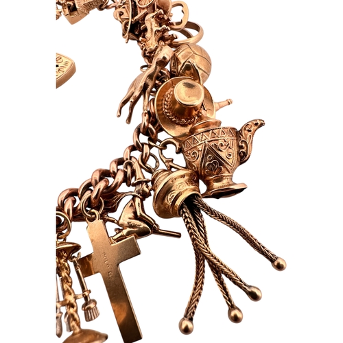 50 - Nine Carat Gold Charm Bracelet with 25 Charms. 78.2g