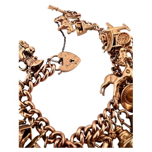 50 - Nine Carat Gold Charm Bracelet with 25 Charms. 78.2g