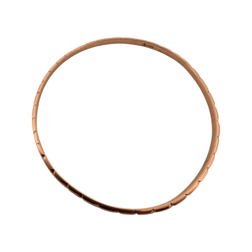 54 - Nine Carat Gold Bangle, Hallmarked with Cut Design. 12g