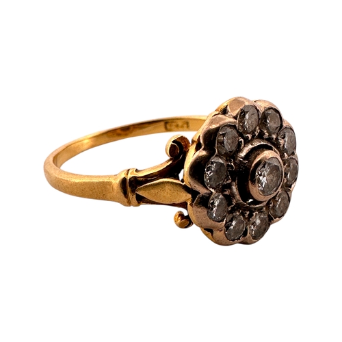 143 - Eighteen Carat Gold and Diamond Cluster Ring set with Eleven Diamonds. Size P. 3.63g