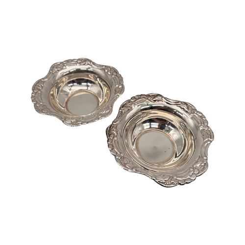 80 - Pair of Spun & Pressed Silver Dishes, marked 'Silver' to the base. 130g