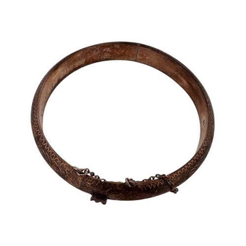 138 - Small Engraved Silver Hinged Bangle. 12g