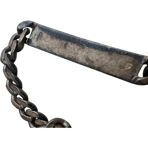 34 - Silver Identity Bracelet. 22.52g...