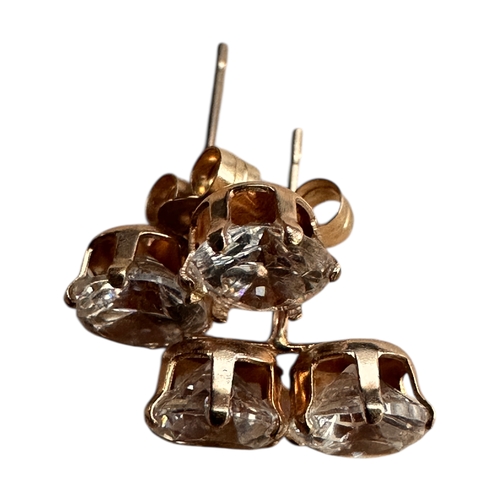 18 - Pair of Yellow Metal earrings with Nine Carat Gold Butterfly Clips set with White Stones. 1.21g...