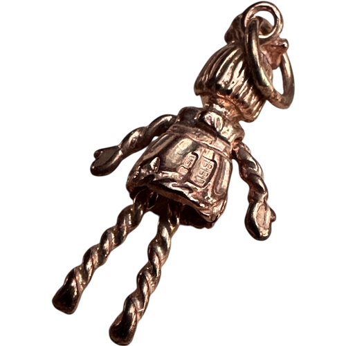 26 - Nine Carat Rose Gold Articulated Doll Charm. 1.55g...