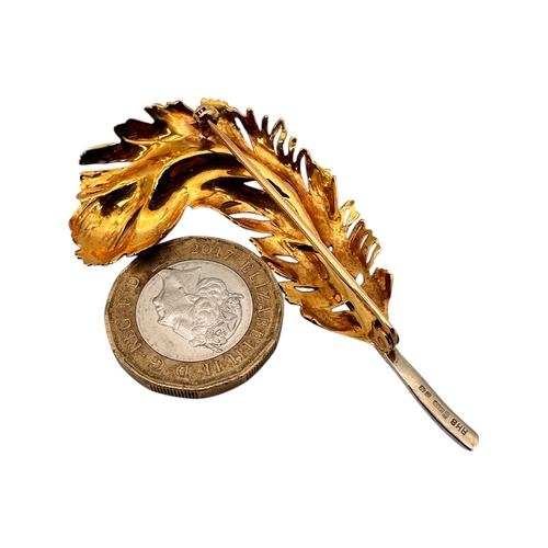 45 - Eighteen Carat Gold Feather Brooch. 9.94g...