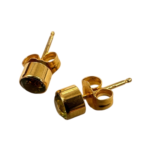 47 - Fourteen Carat Gold and Peridot Earrings. 0.8g...