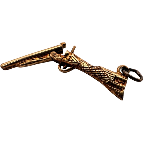 48 - Nine Carat Gold Sawn Off Shot Gun Pendant Charm. 2.85g...
