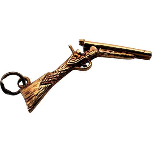 48 - Nine Carat Gold Sawn Off Shot Gun Pendant Charm. 2.85g...