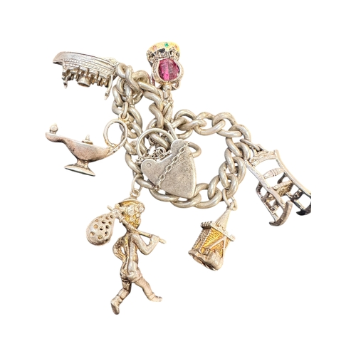 49 - Silver Charm Bracelet 45.46g...
