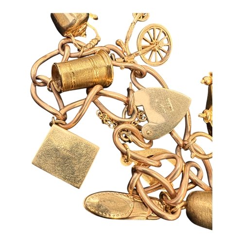 53 - Antique Nine Carat Rose Gold Charm Bracelet with Gold Charms. 26g...