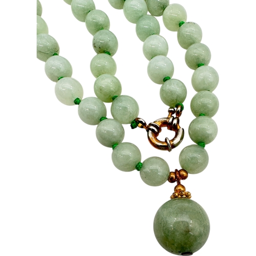 11 - Pale Green Jade Bead Necklace with Drop and Gilt Metal Fittings. Length 22