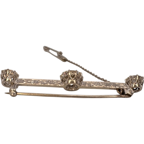 16 - Platinum & Diamond Bar Brooch. Approximately 3.8 Carats of Diamonds. 2.0ct Centre Diamond with 0.9ct...