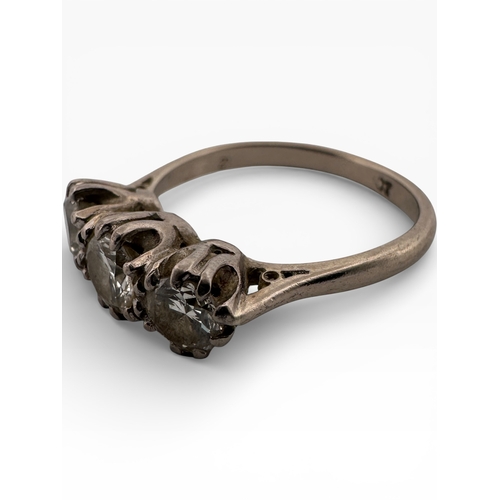 119 - White Gold Ring set with Three Diamonds. Rubbed Mark. Size P. 4.28g