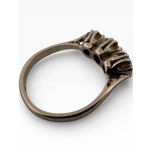 119 - White Gold Ring set with Three Diamonds. Rubbed Mark. Size P. 4.28g