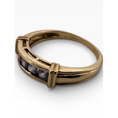 123 - Nine Carat Gold QVC Ring set with Purple Stones. Size R. 2.77g