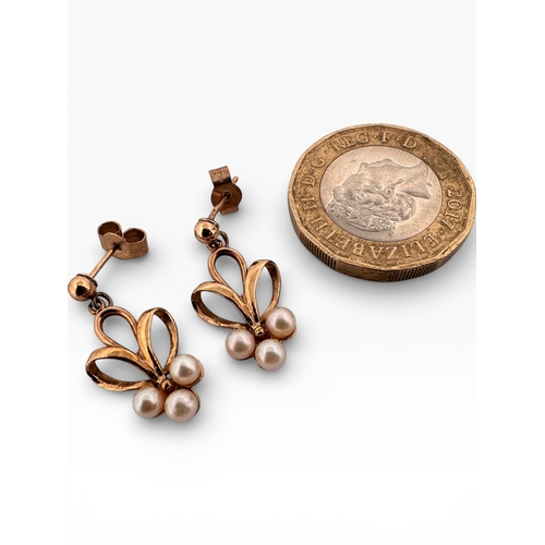 12 - Pair of Nine Carat Gold and Seed Pearl Earrings. 1.9g...