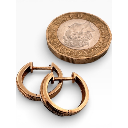 33 - Pair of Nine Carat Gold and Diamond Hoop Earrings. 2.22g...
