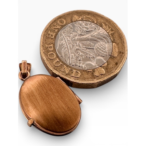 34 - Small Nine Carat Gold Photograph Locket. 1.32g...