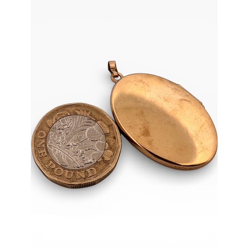 36 - Nine Carat Gold Large Photograph Locket. 4.5g...