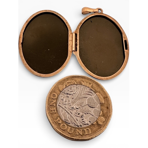 36 - Nine Carat Gold Large Photograph Locket. 4.5g...