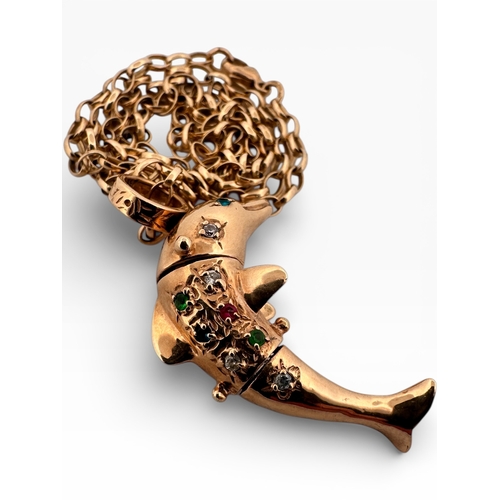 20 - Nine Carat Gold Dolphin Pendant set with Gem Stones on 17
