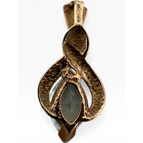 11 - Nine Carat Gold and Aquamarine Coloured Stone Pendant. 1.08g...