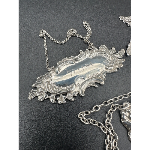 229 - Three Hallmarked Silver Decanter Labels. 24.26g