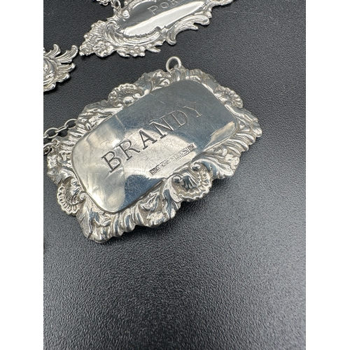 229 - Three Hallmarked Silver Decanter Labels. 24.26g