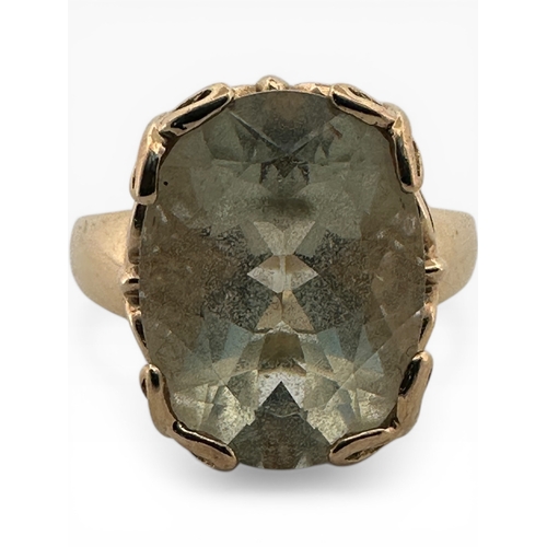 181 - Nine Carat Gold Ring set with Large Aquamarine style Stone. Size P. 6.58g