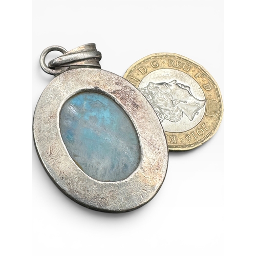 5 - 925 Silver and Moonstone Pendant. 13.7g gross...