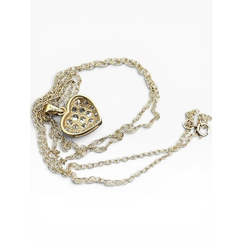 7 - Nine Carat Gold Necklace with Heart Pendant. 1.55g...