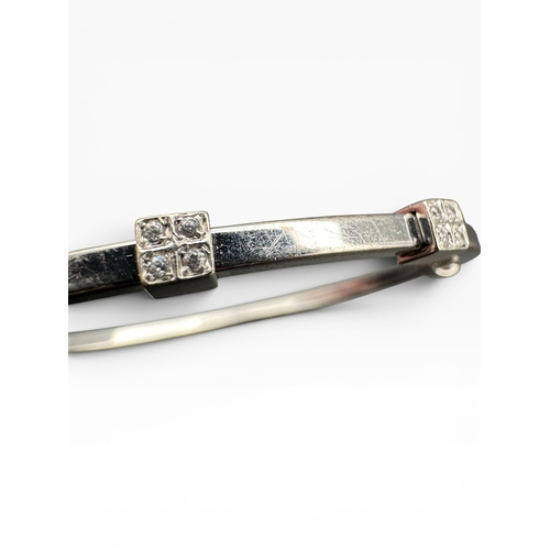 17 - Nine Carat White Gold and Diamond Bangle 7.8g...