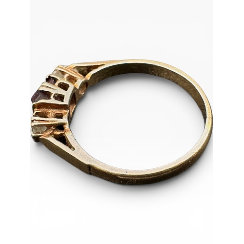 55 - Nine Carat Gold Ring set with White and Purple Stone. Size L. 1.82g...