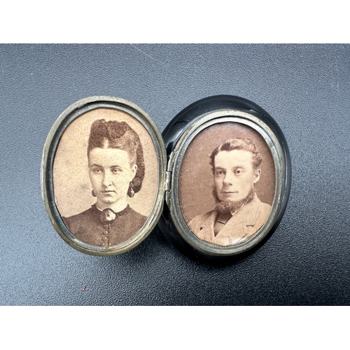 32 - Antique Whitby Jet and White Metal Brooch Locket with Old Photographs Inside...