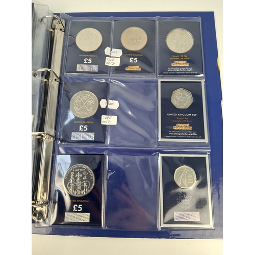 463 - Collection of Approximately 65 Commemorative 50p, £1 and £5 Coins in Change Checker Binder including... 