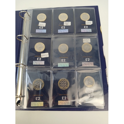 464 - Collection of Approximately 20 Commemorative £2 Coins In Change Checker Binder