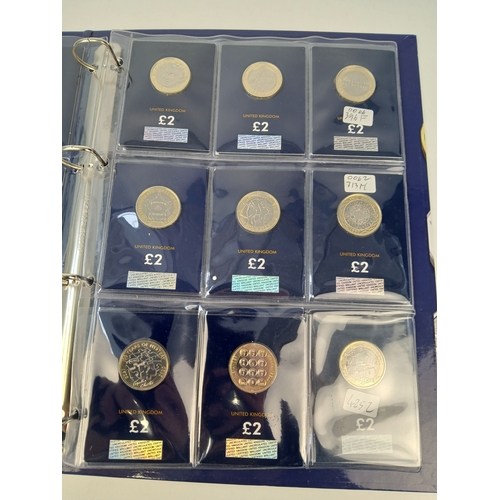 464 - Collection of Approximately 20 Commemorative £2 Coins In Change Checker Binder