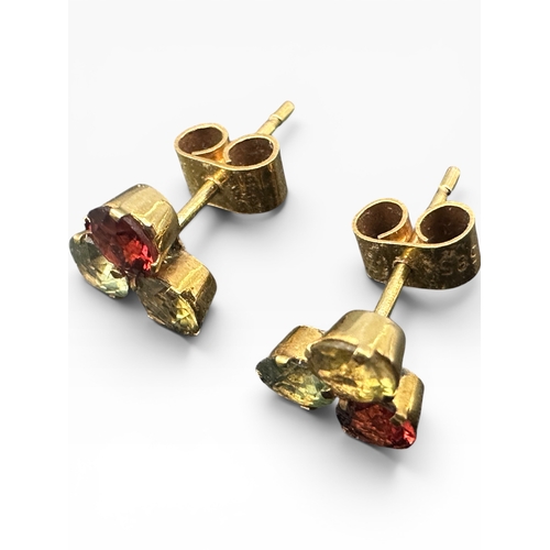 4 - Nine Carat Gold Stud earrings with Coloured Stones. 0.9g...