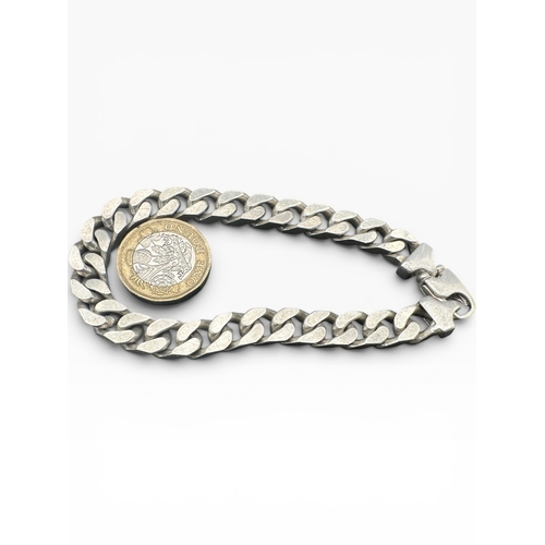 7 - Chunky Silver Curb Link Bracelet. Stamped 925. 42.8g...
