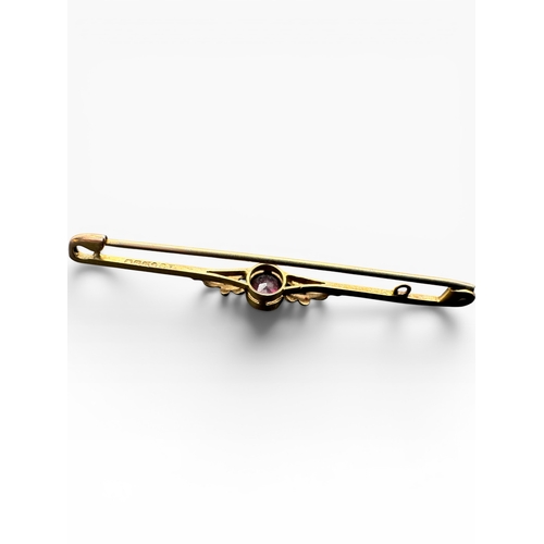 20 - Nine Carat Gold and Amethyst Bar Brooch. 1.6g...