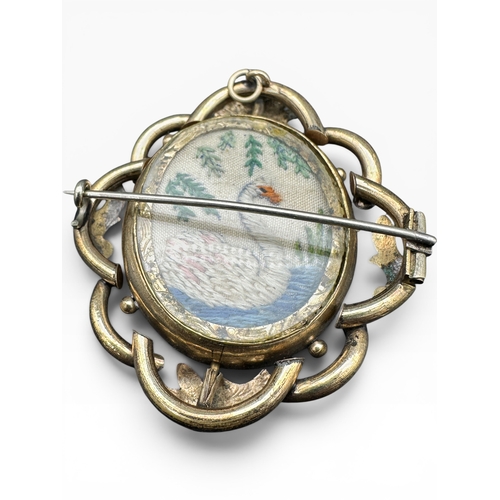 28 - Victorian Gilt Metal Brooch with Revolving Centre with Carved Stag Horn and Embroidery Panels....