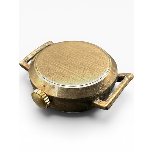 37 - Ladies Smiths Nine Carat Gold Cased Watch. 7g gross...