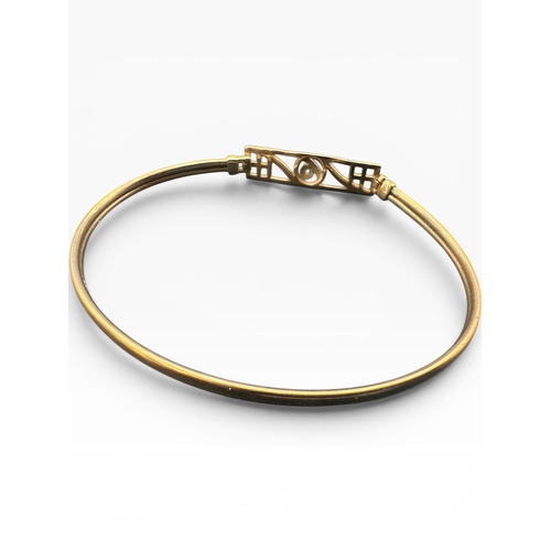 53 - Nine Carat Gold Bangle with Mackintosh style Design. 3.89g...