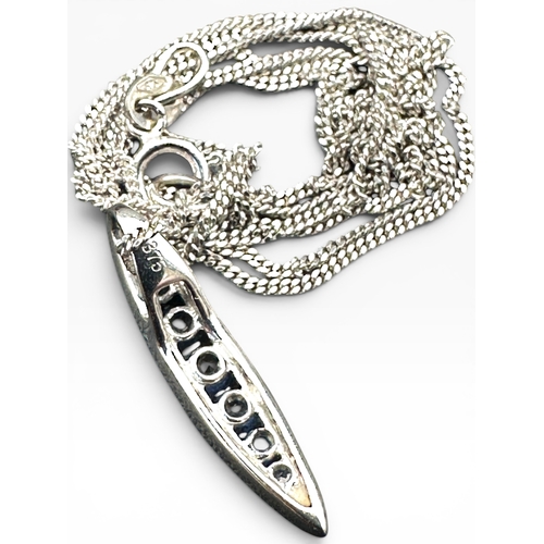 55 - Nine Carat White Gold Necklace with Nine Carat White Gold Pendant set with Sapphires. 2.05g...