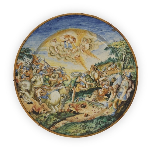 1 - A Continental istoriato maiolica charger, probably second half 19th century, painted with the conver... 