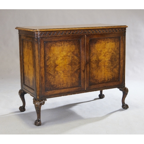 154 - A Victorian walnut cabinet, of Queen Anne style, last quarter 19th century, with two doors, enclosin... 