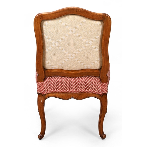 179 - A Louis XV stained beechwood side chair, third quarter 18th century, the shaped back to over stuffed... 