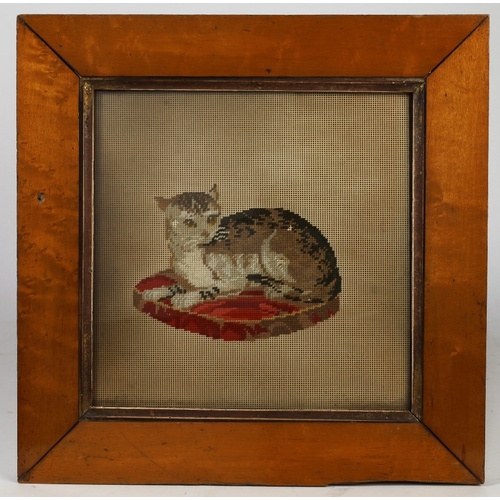 40 - A group of three embroidered pictures, 20th century, to include two needlepoint pictures of a cat an... 